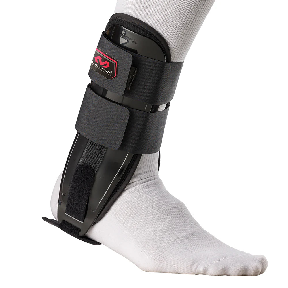 Black ankle support brace on a white background