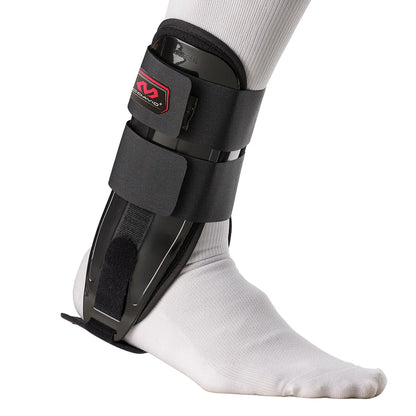 Black ankle support brace on a white background