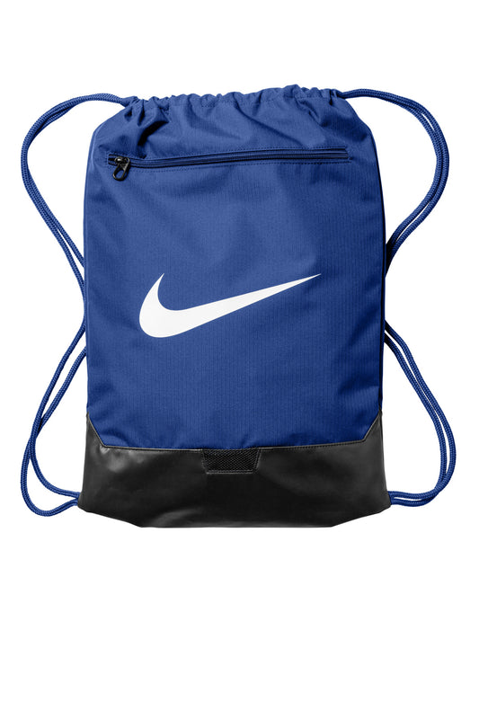 Blue drawstring bag with a white Nike logo on a white background