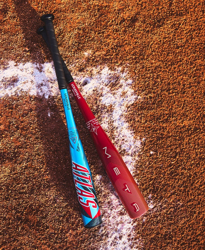 Two baseball bats with 'Atlas' branding on a dirt field.